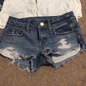 Mid rise destroyed shorts